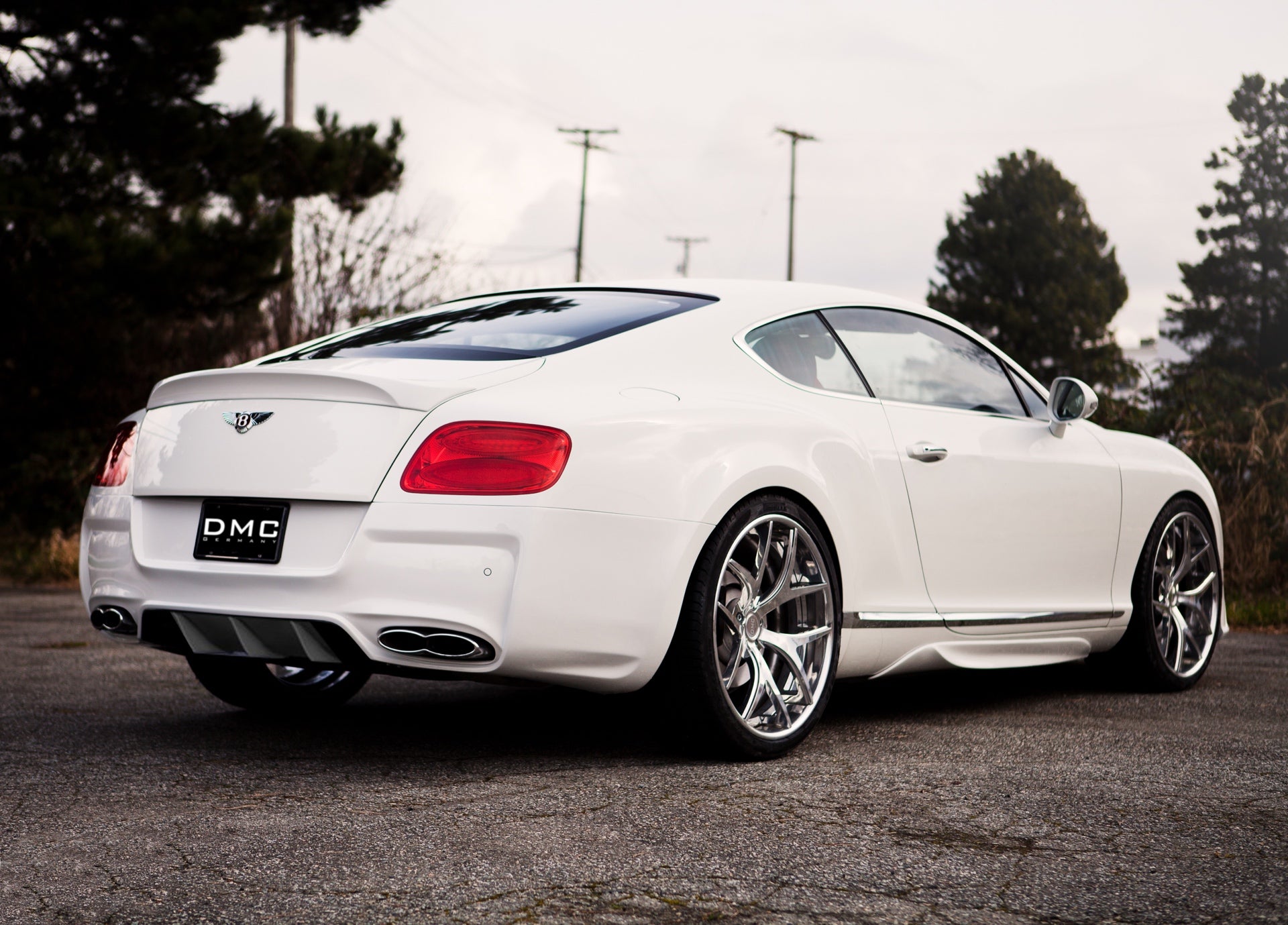 Paraurti posteriore con diffusore in fibra di carbonio DMC per Bentley Continental GT Coupé e GTC originali
